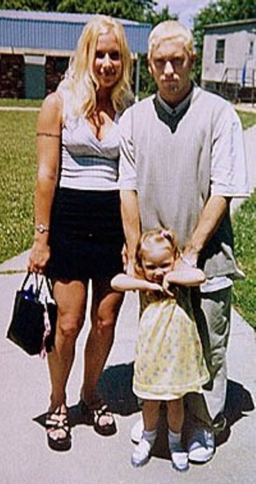 Eminem with his ex-wife Kimberly Anne Scott and their daughter Hallie.